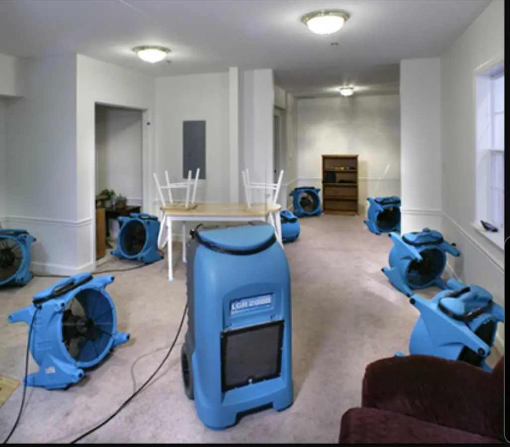Air movers and dehumidifier setup for Water Damage Restoration in Seven Oaks